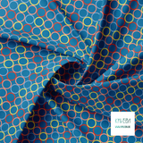 Random pink, red, blue and yellow circles fabric