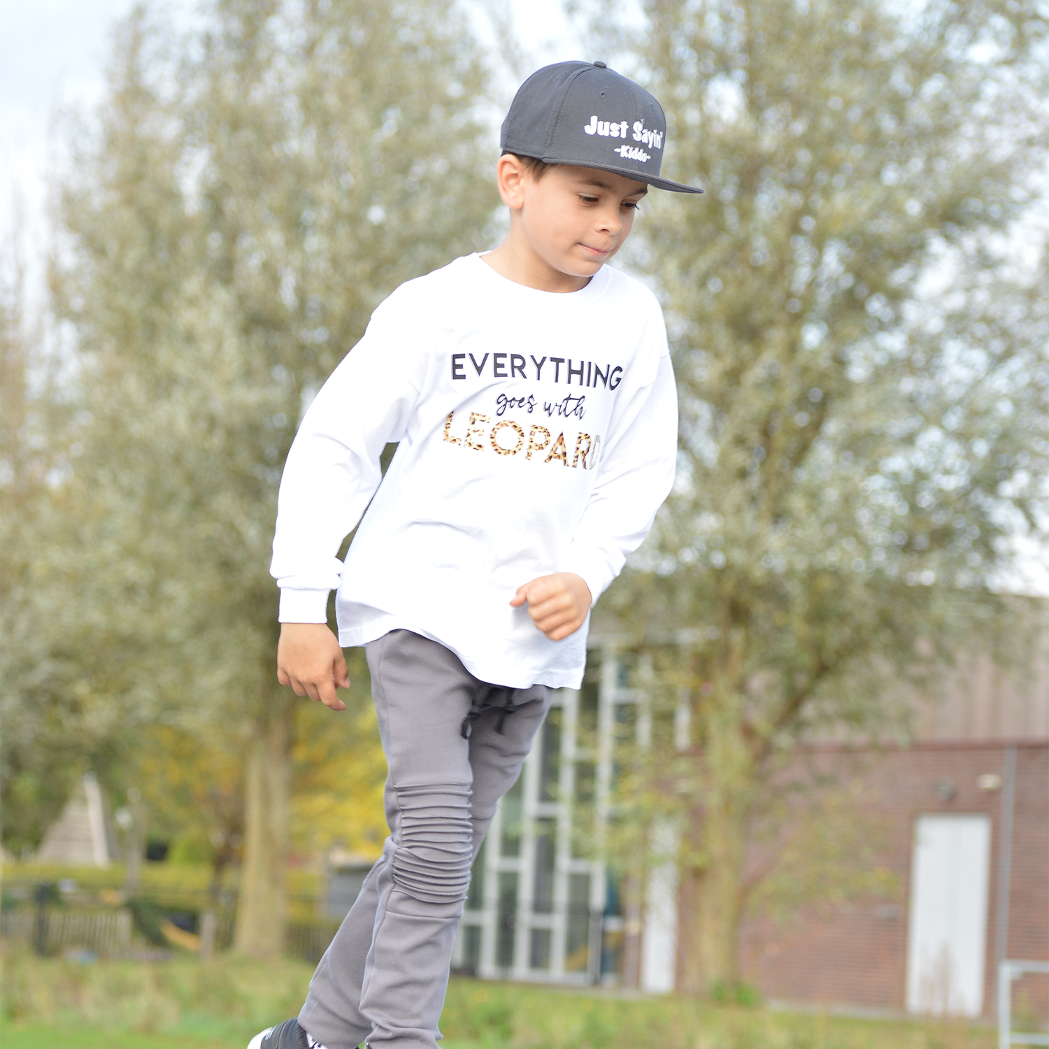 'Everything goes with leopard' kids longsleeve shirt