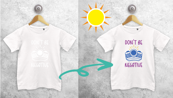 'Don't be negative' magic kids shortsleeve shirt