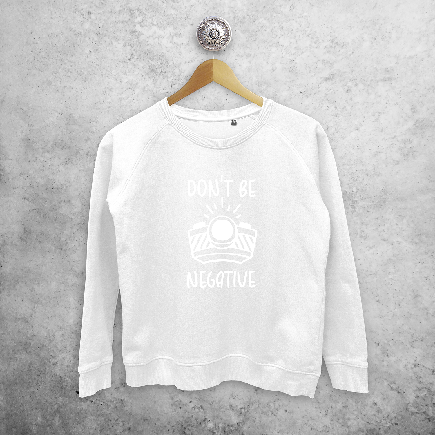 'Don't be negative' magic sweater