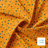 Yellow, navy, orange and green triangles fabric