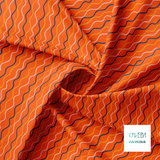 Irregular orange, pink and navy waves fabric