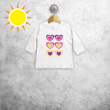 Zonnebrillen en hartjes magisch baby shirt met lange mouwen