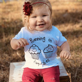 'Running on cupcakes' baby shortsleeve shirt