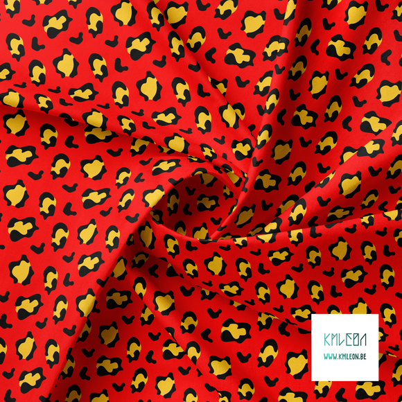 Yellow and black leopard print fabric
