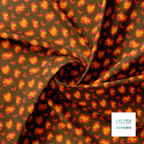 Orange and red leopard print fabric