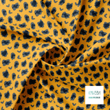 Grey and dark teal leopard print fabric