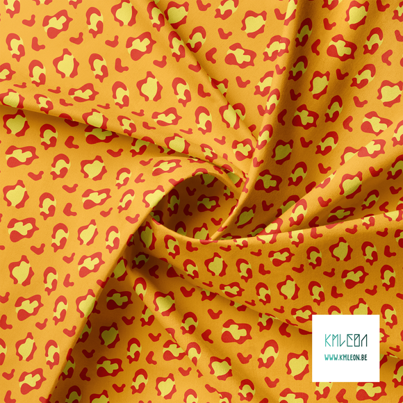 Yellow and red leopard print fabric