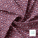 Purple and pink leopard print fabric