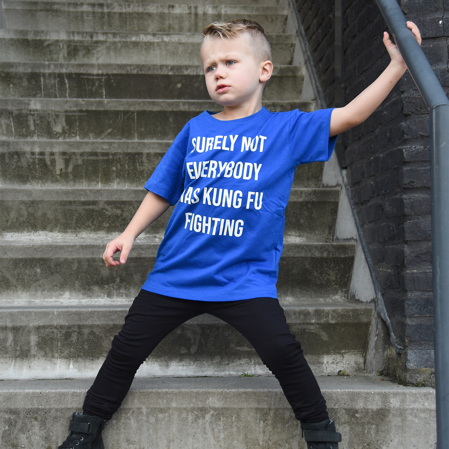'Surely not everybody was kung fu fighting' kids shortsleeve shirt