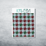Irregular red and green houndstooth fabric