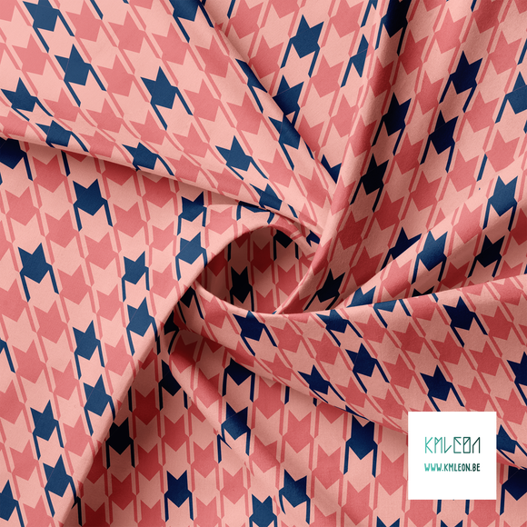 Irregular pink and navy houndstooth fabric