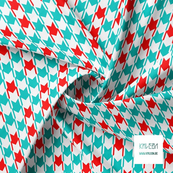 Irregular teal and red houndstooth fabric