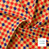 Irregular red and blue houndstooth fabric