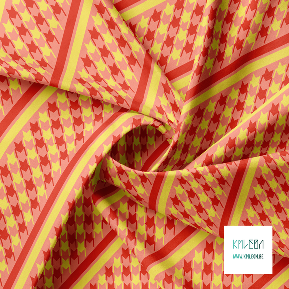 Red and yellow houndstooth and stripes fabric