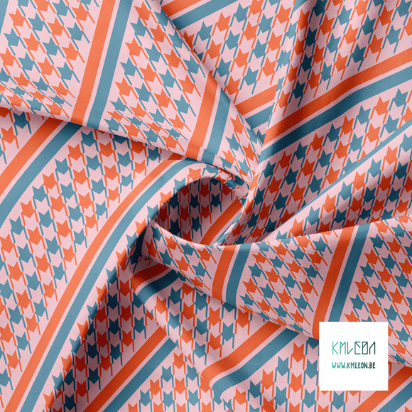Blue and orange houndstooth and stripes fabric
