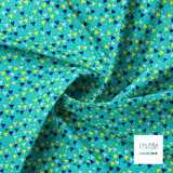 Mint green, yellow and blue triangles fabric