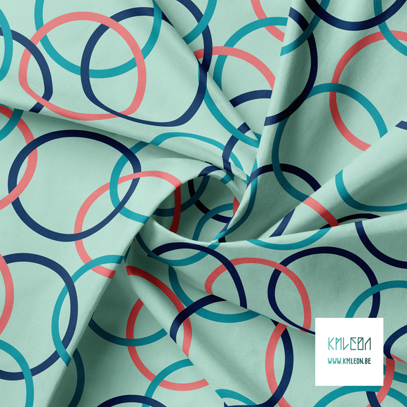 Pink, teal and navy interlocking rings fabric
