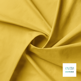 Solid saffron yellow fabric