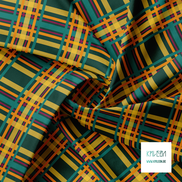 Green, orange, yellow and purple tartan fabric