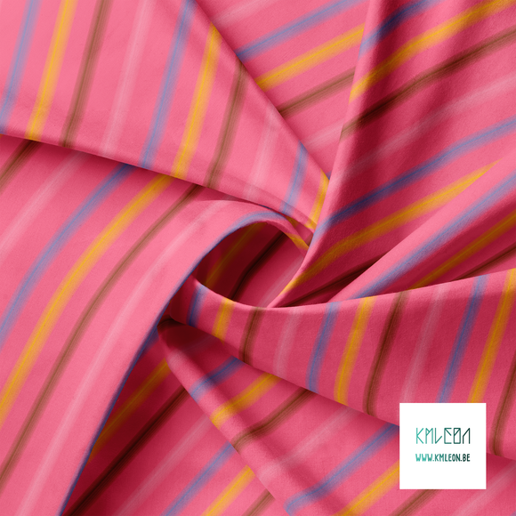 Soft horizontal stripes in pink, brown, blue and yellow fabric