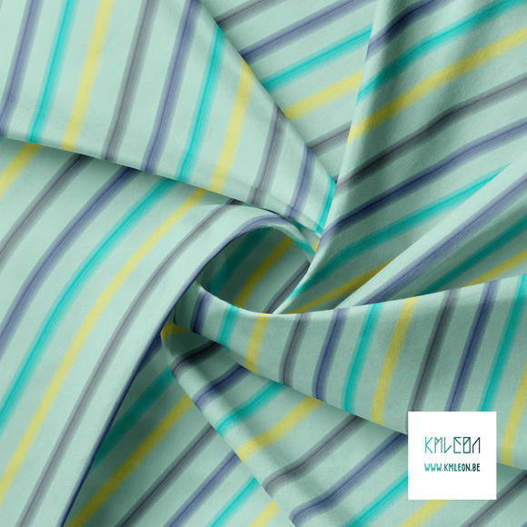 Soft horizontal stripes in yellow, blue, navy and teal fabric