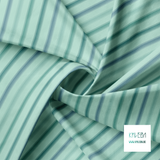 Zachte horizontale strepen in groen en blauw stof