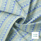Yellow, periwinkle and pink circles and triangles fabric