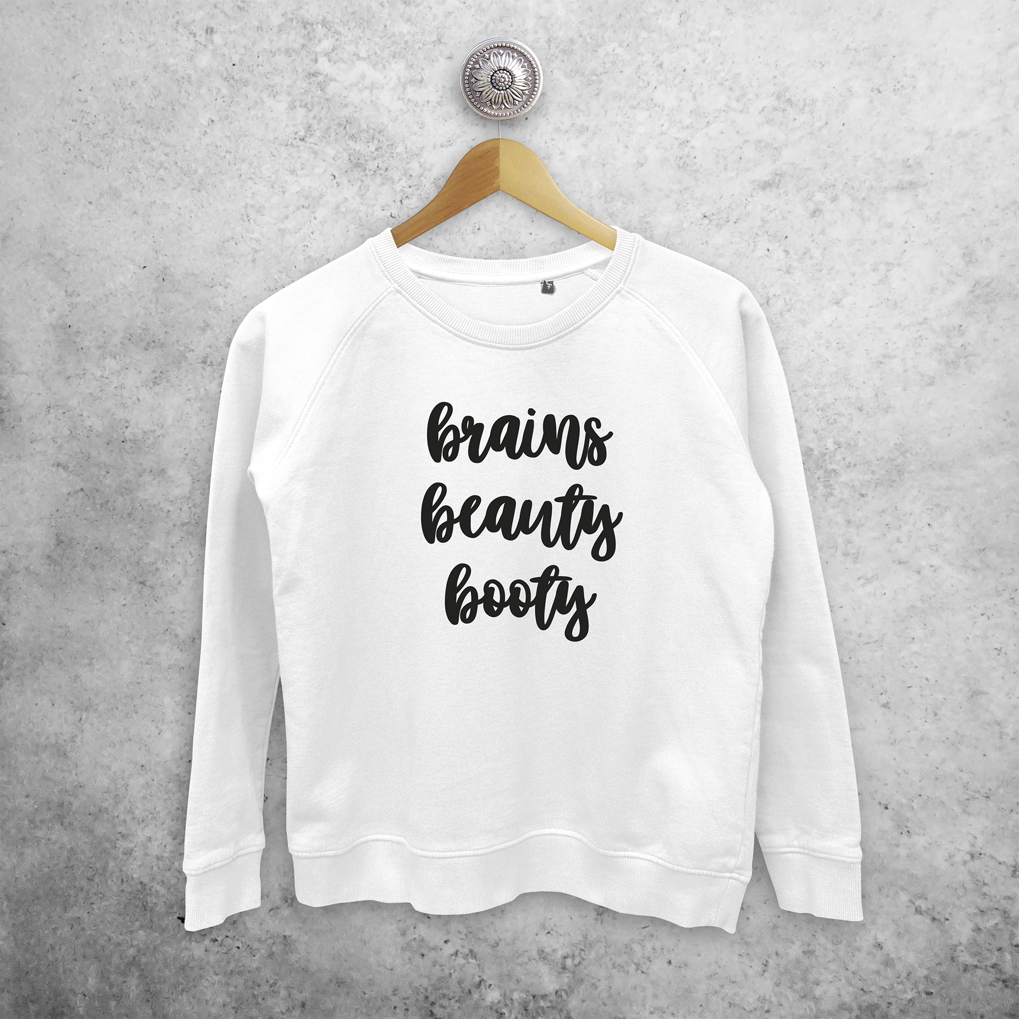 'Brains, beauty, booty' sweater