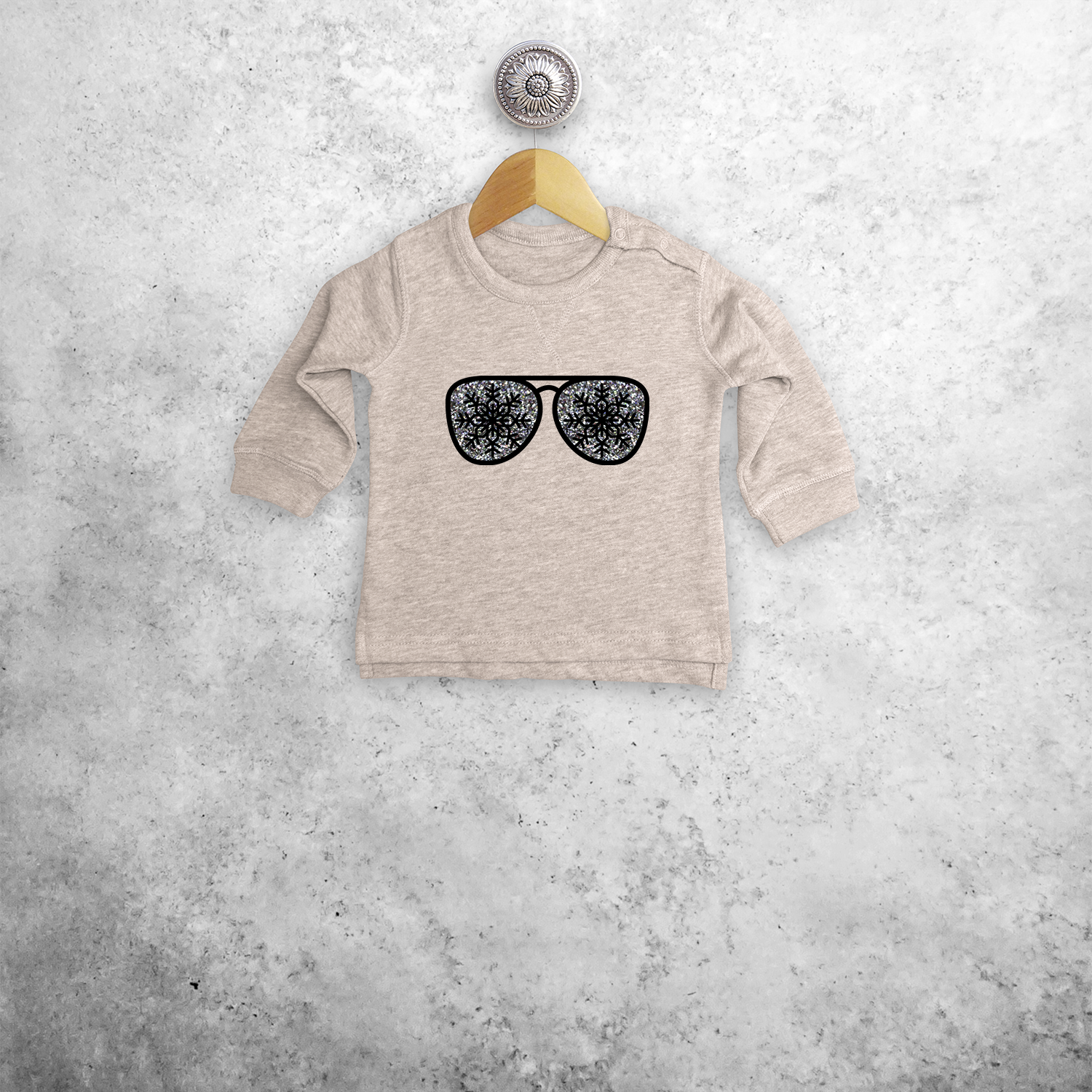 Baby or toddler sweater, with glitter snow star glasses print by KMLeon.
