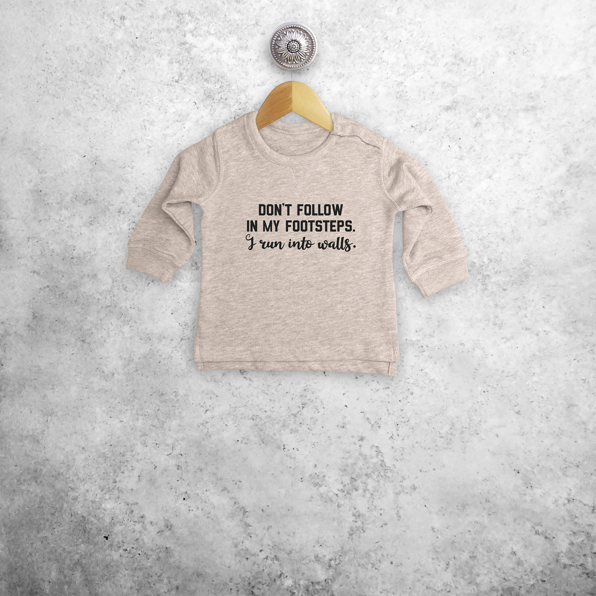 'Don't follow in my footsteps. I run into walls' baby sweater