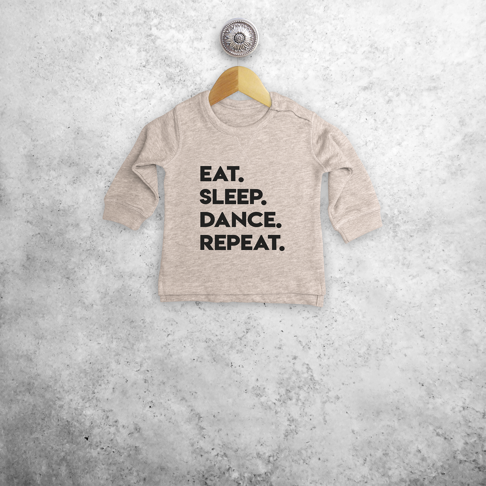 'Eat. Sleep. Dance. Repeat.' baby sweater