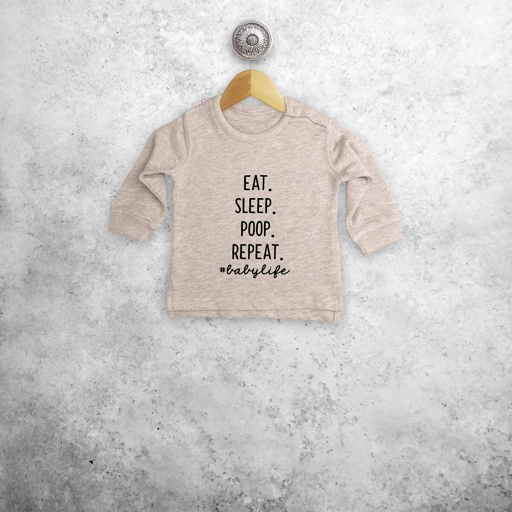 'Eat. Sleep. Poop. Repeat. #babylife' baby sweater