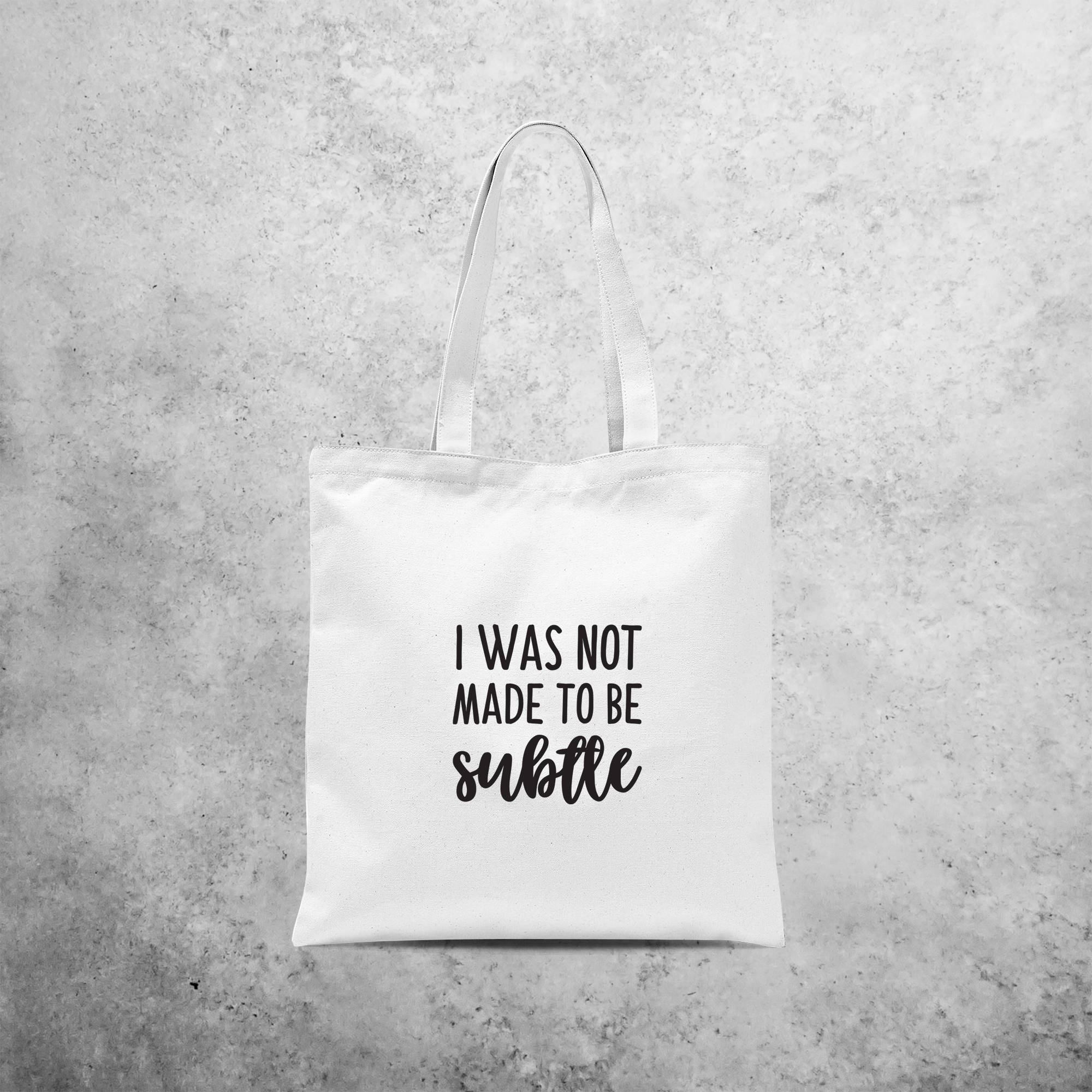 'I was not made to be subtle' tote bag