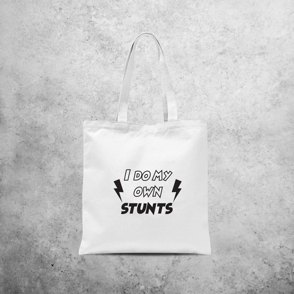 'I do my own stunts' tote bag