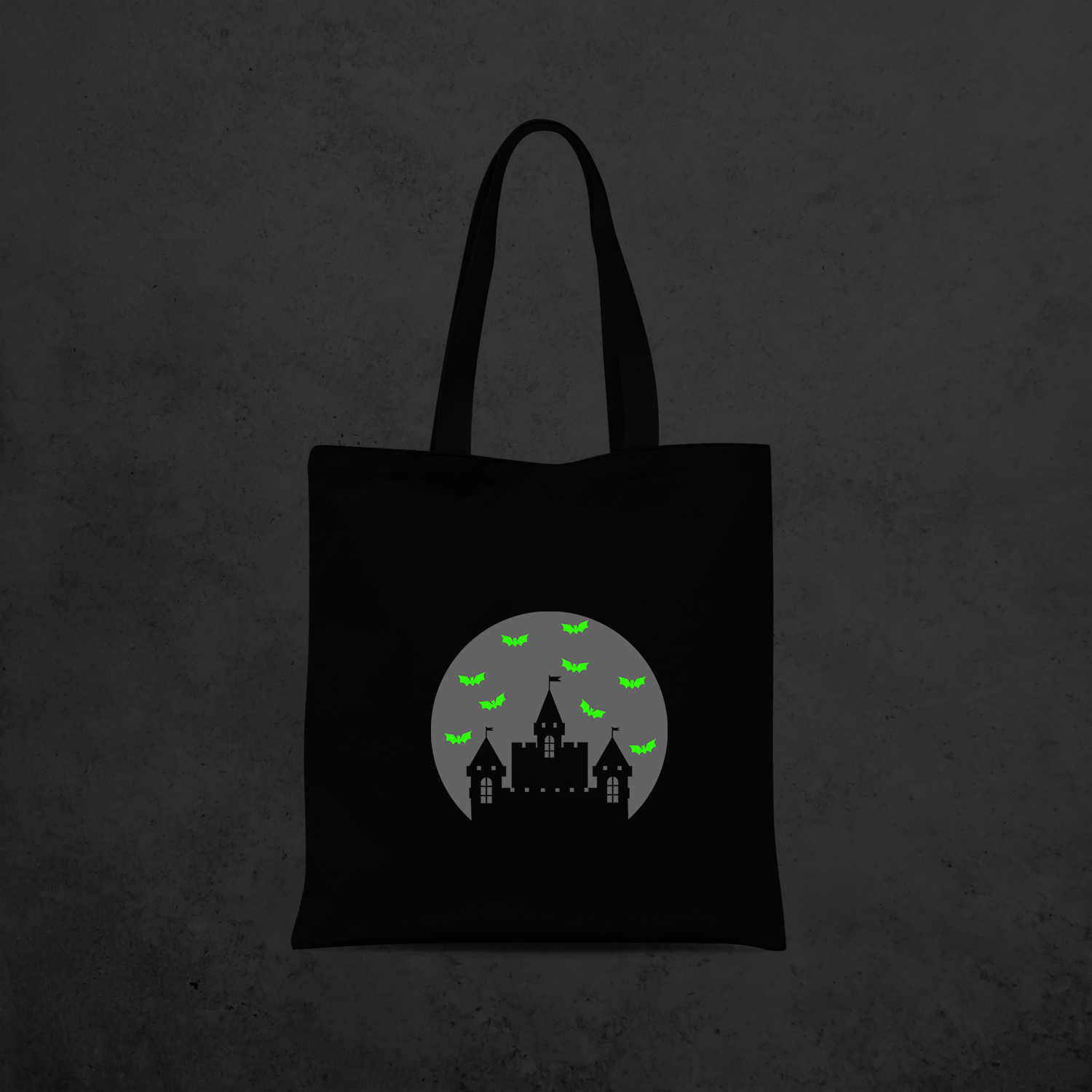 Castle and bats glow in the dark tote bag