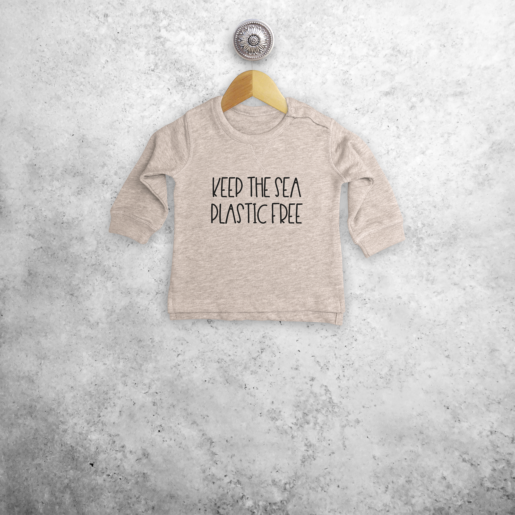 'Keep the sea plastic free' baby sweater