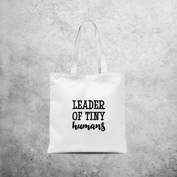 'Leader of tiny humans' tote bag