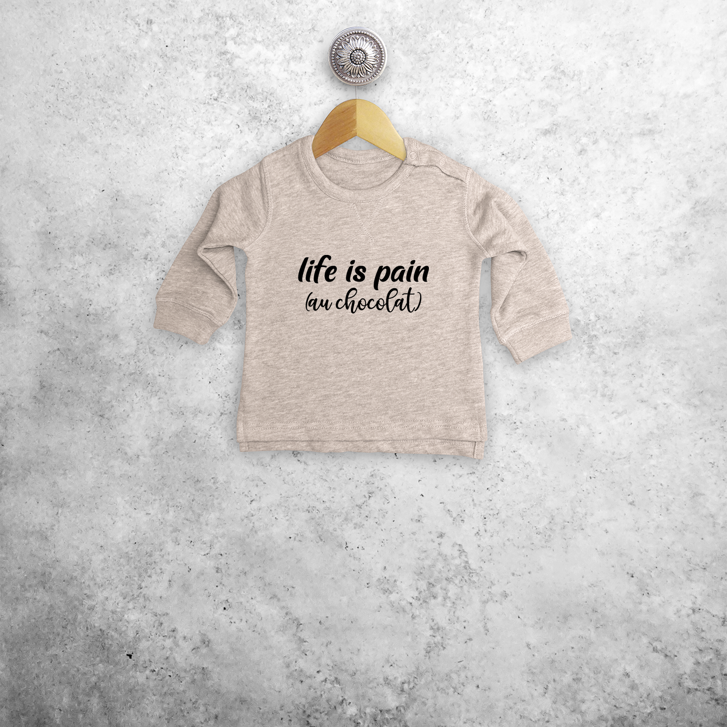 'Life is pain (au chocolat)' baby sweater