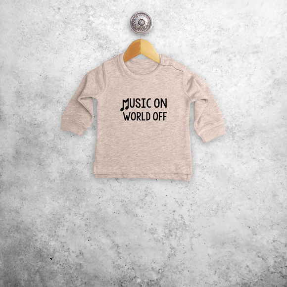 'Music on - World off' baby sweater