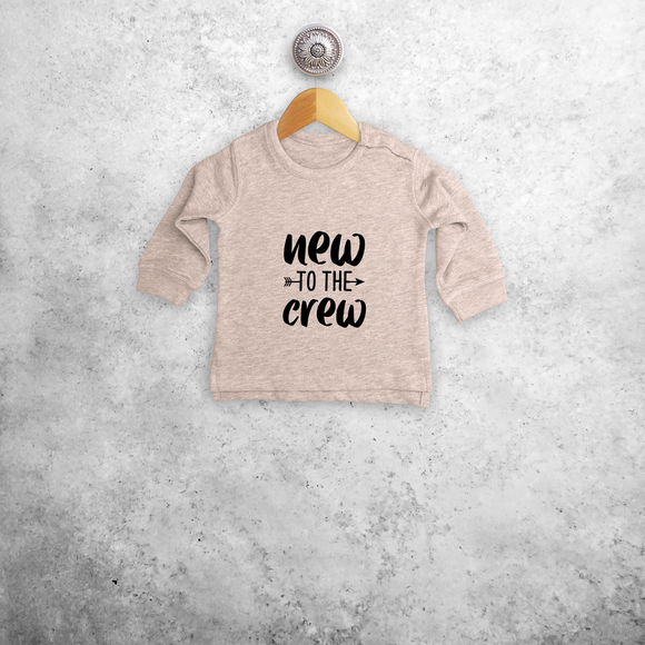 'New to the crew' baby sweater