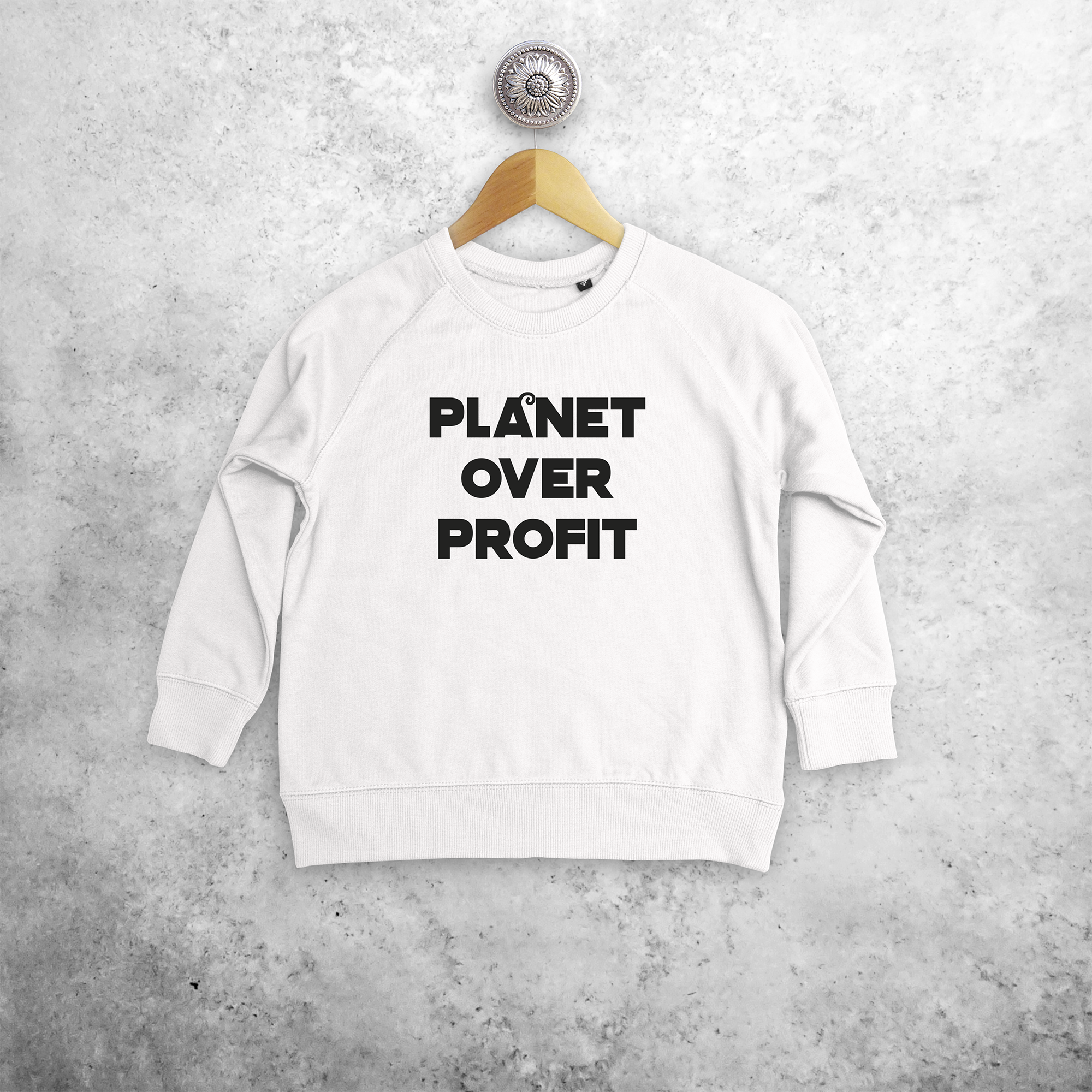 'Planet over profit' kids sweater