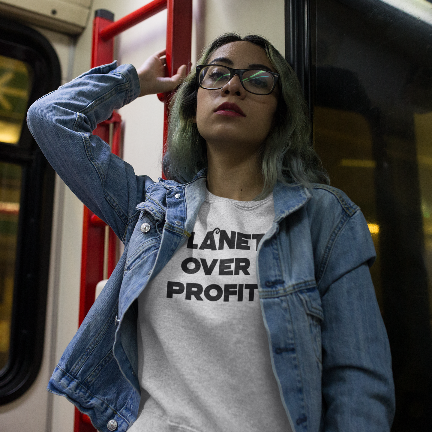'Planet over profit' sweater