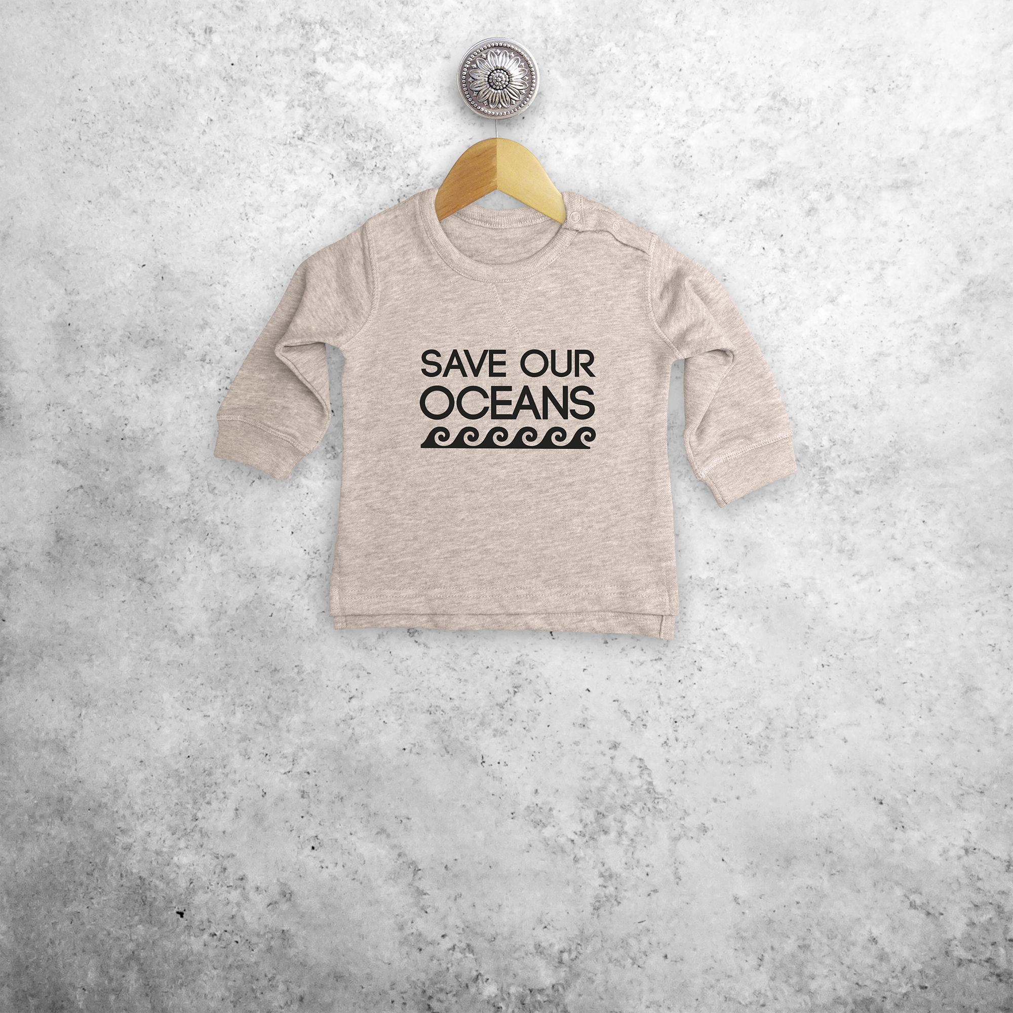 'Save our oceans' baby sweater
