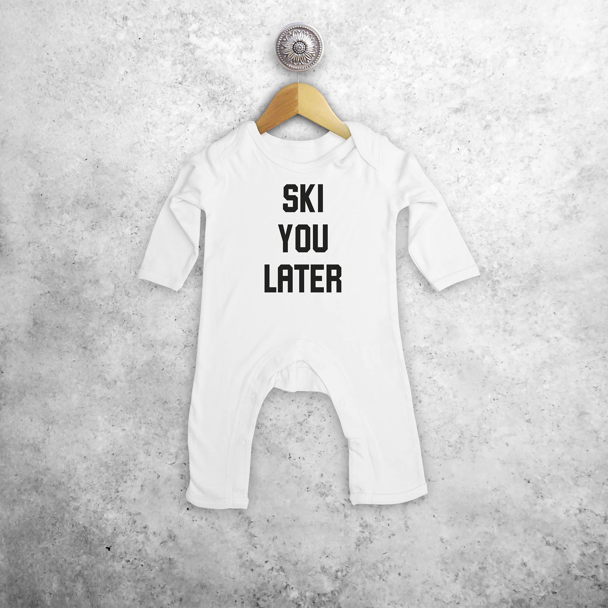 Baby or toddler romper with long sleeves, with ‘Ski you later’ print by KMLeon.