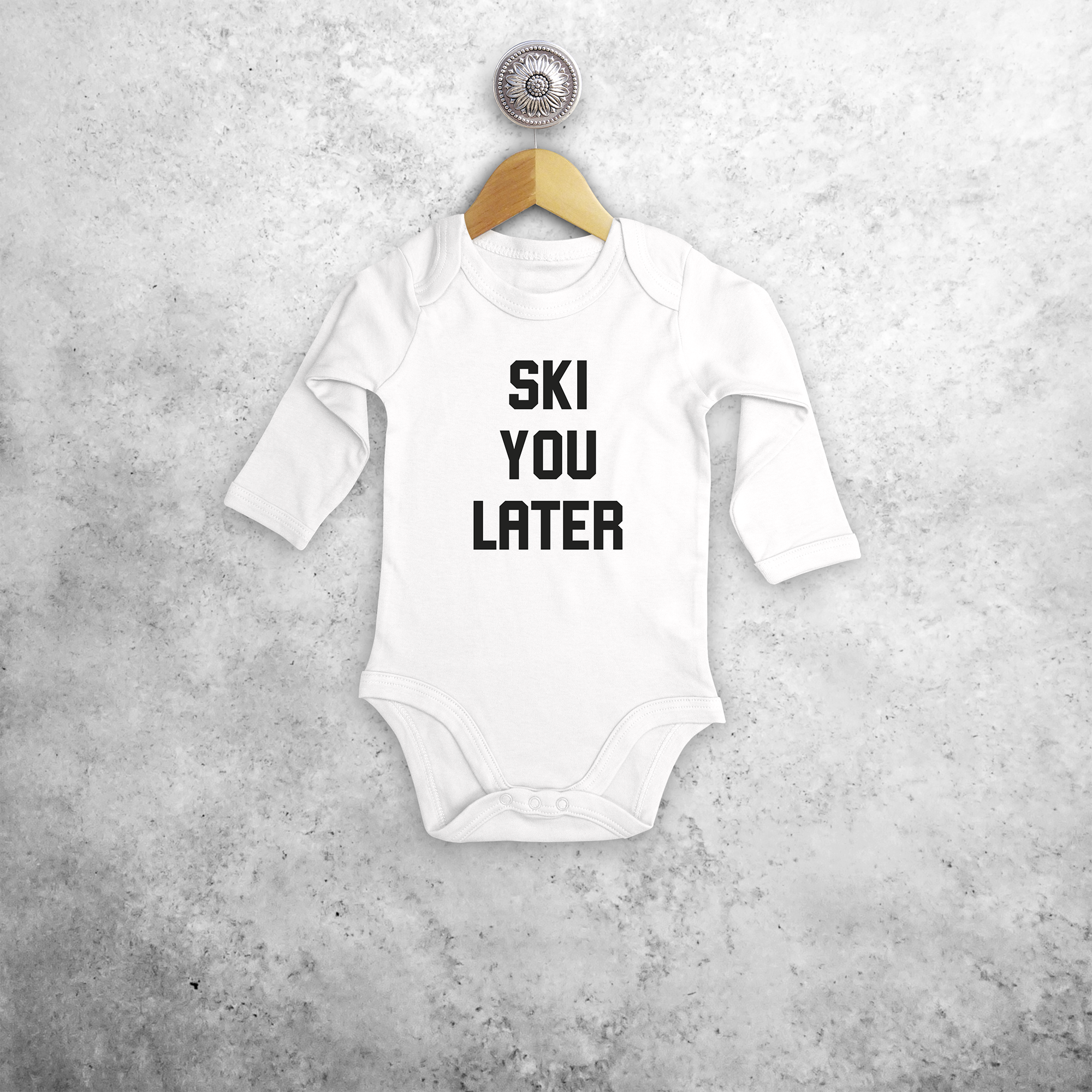 Baby or toddler bodysuit with long sleeves, with ‘Ski you later’ print by KMLeon.
