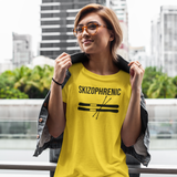 Smiling woman with glasses in the city wearing yekllow shirt with 'Skizophrenic' print by KMLeon.