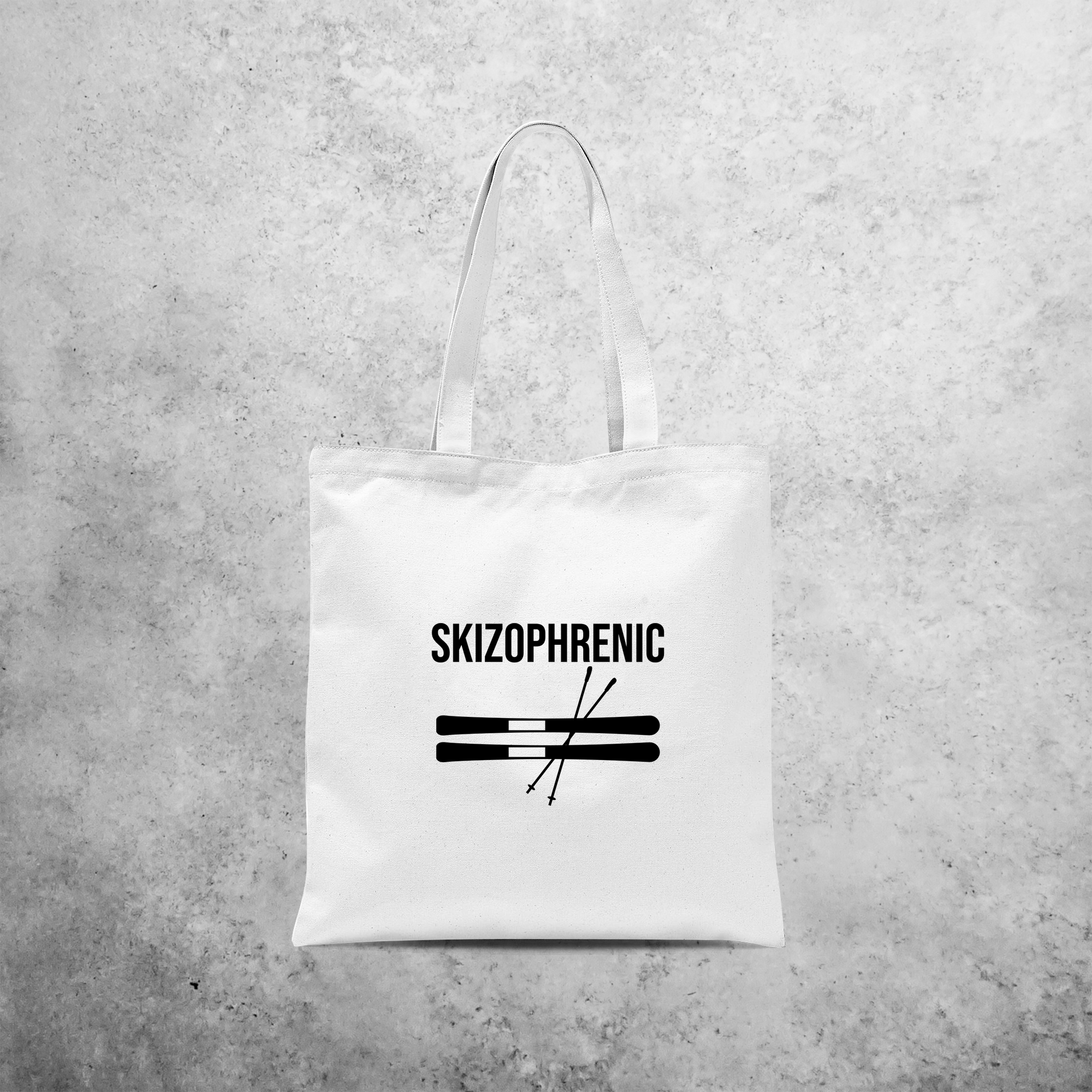 Tote bag, with ‘Skizophrenic’ print by KMLeon.