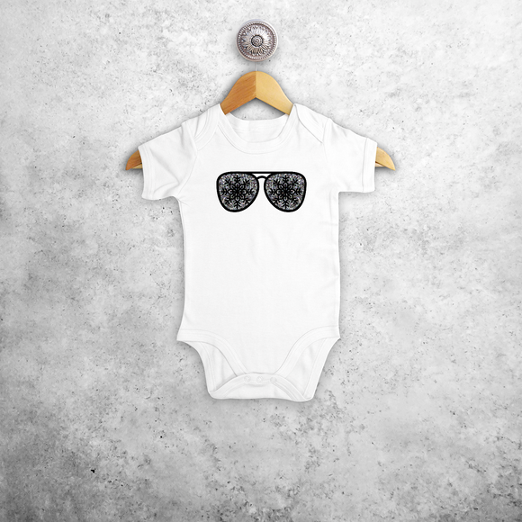 Baby or toddler bodysuit with short sleeves, with glitter snow star glasses print by KMLeon.