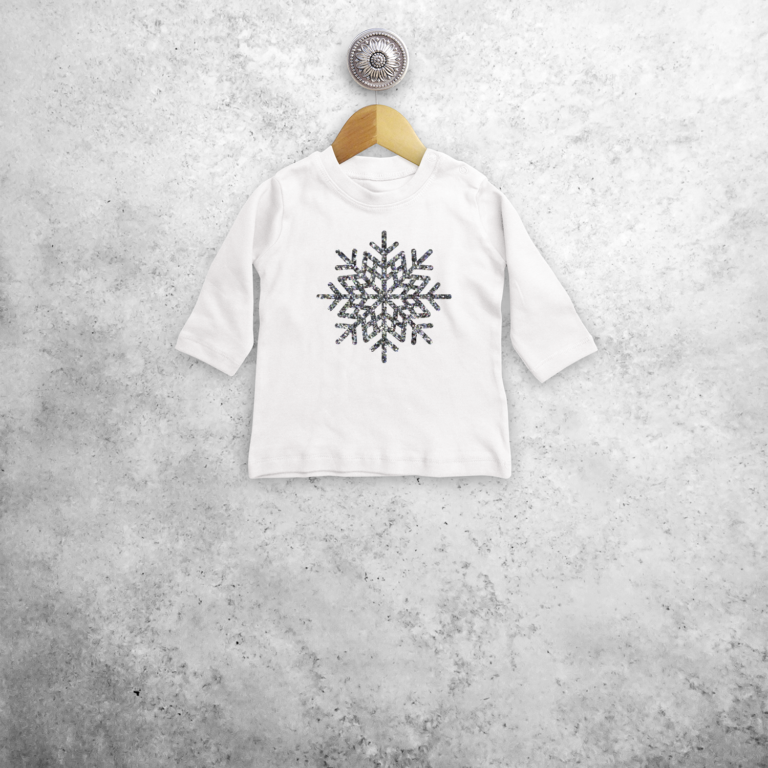 Baby or toddler shirt with long sleeves, with glitter snow star print by KMLeon.